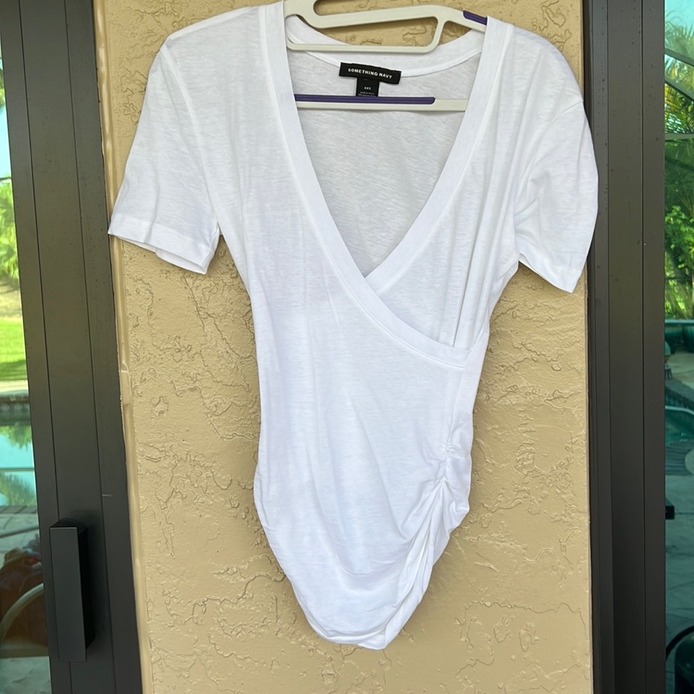 Something Nsvy great white sexy top, never worn